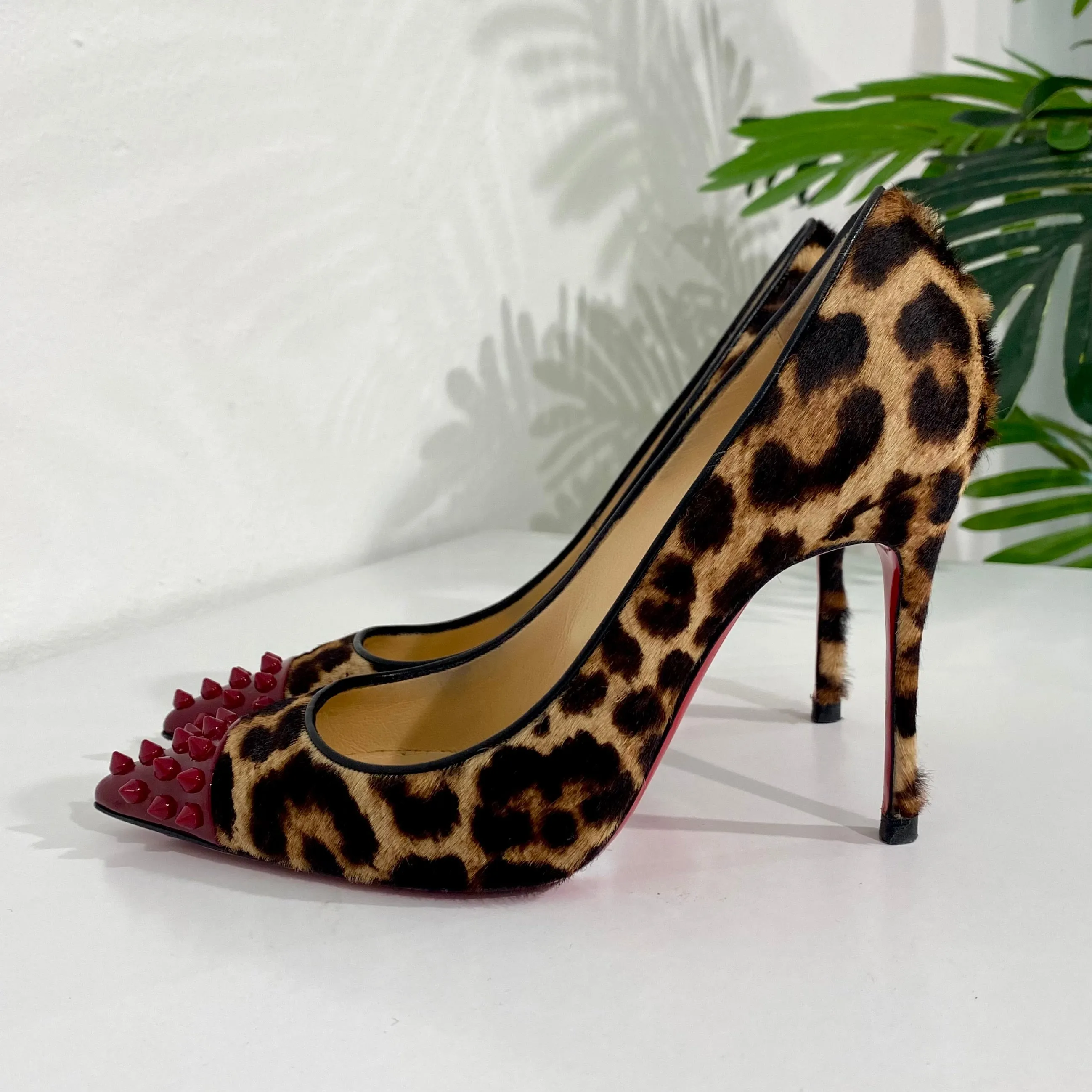 Christian Louboutin Red Spike Leopard Pumps